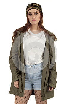 Pretty parka coat wearing grunge, rock punk girl in a long oversized white t-shirt with a blank space ready for your design