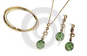 Pretty pendant and couple of earrings isolated on white