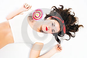 Pretty pin up girl with lollipop