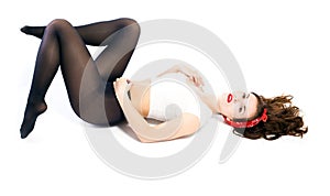 Pretty pin up girl in stockings isolated white