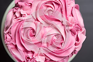 Pretty pink cake with icing sugar roses
