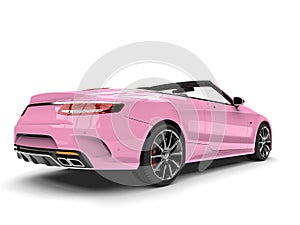 Pretty pink modern luxury convertible car - back view