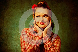 Pretty pinup girl in retro vintage 50`s style