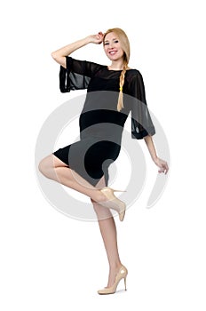 Pretty pregnant woman in black dress isolated on