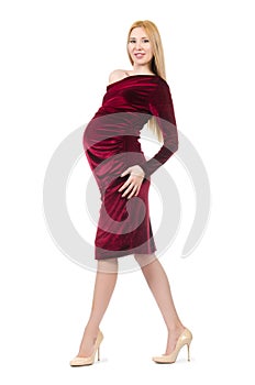 Pretty pregnant woman in red dress isolated on
