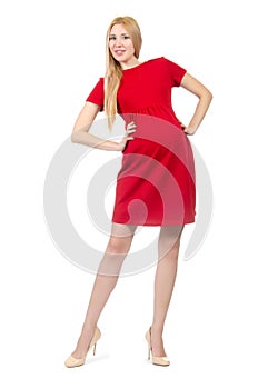 Pretty pregnant woman in red dress isolated on