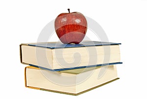 Pretty Red Apple On Stack Of Books