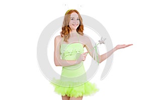 Pretty red hair fairy in green dress isolated on