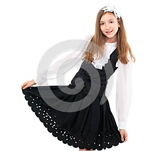 Pretty schoolgirl isolated on a white background