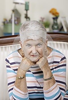 Pretty Senior Woman with Chin on Hands