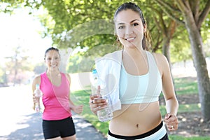 Pretty Sisters Jogging in Park