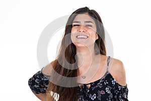 Pretty smiling joyfully woman with long hair dressed casually looking smiling camera joy happy aside copyspace