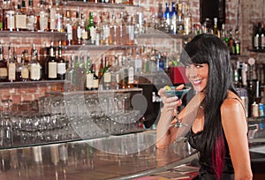 Pretty Smiling Woman with Martini photo