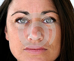 Pretty Spanish woman face close up