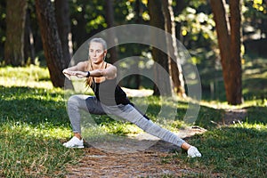 Pretty Sportish Girl Stretching Before The Running