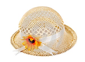 Pretty straw hat with flower on isolated background