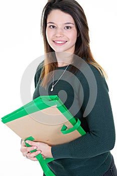 Pretty student with folders in hands in white background