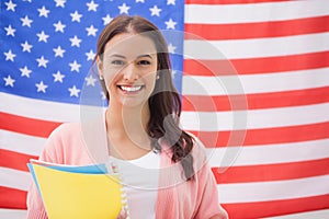 Pretty student smiling at camera