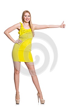 Pretty tall woman in short yellow dress isolated