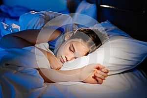 The pretty teen girl naps in bedroom, sees sleep. healthy sleep.