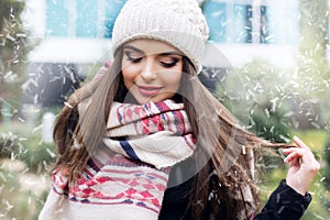 Pretty teen girl is wearing warm winter clothes