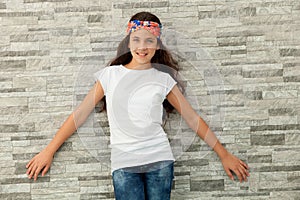 Pretty teenager girl with a flowered headband