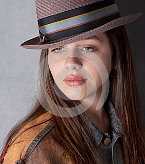 Pretty Teenager in Jean Jacket and Hat