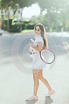 pretty tennis player, young woman with