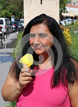 Pretty Turkish Woman holding a Ice Cream cone