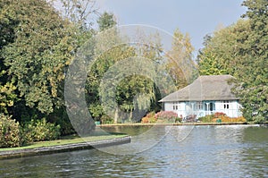 Pretty UK riverside cottage with large river