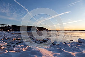 Pretty view of the St. Lawrence river, the 1908 railway trestle bridge and the Cap-Rouge bay