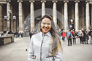 Pretty visitor standing in front of famous British Museum in London, Great Britain