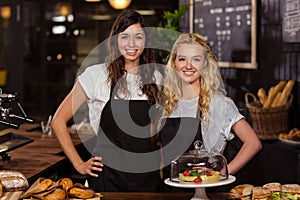 Pretty waitresses behind the counter