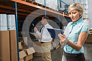 Pretty warehouse manager using tablet pc