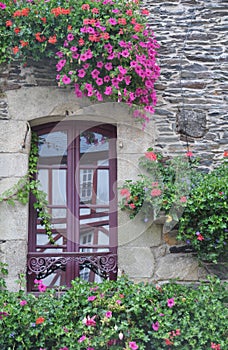 Pretty window Rochefort-en-Terre, France.