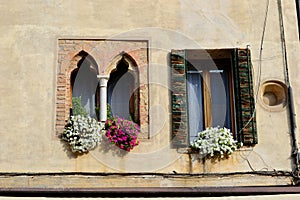 Pretty windows and flowers Asolo Italy