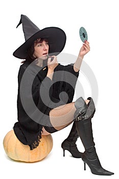 Pretty witch making up