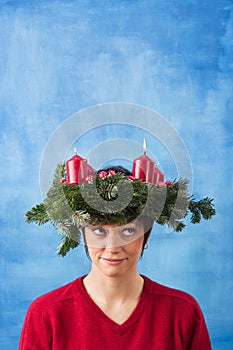 Pretty woman with advent wreath