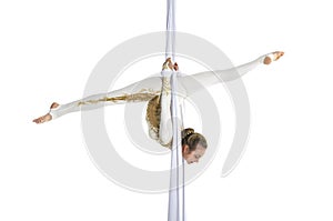 Pretty woman - aerialist performing aerial tricks on aerial silks.