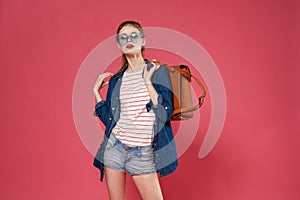 Pretty woman backpack clothes pink background model teenager