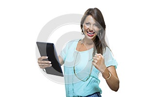 Pretty Woman Browsing at her Tablet Computer