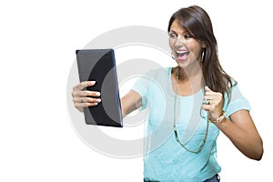 Pretty Woman Browsing at her Tablet Computer