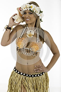 Pretty woman dressed in Hawaiian costume