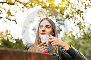 Pretty woman drinking coffee