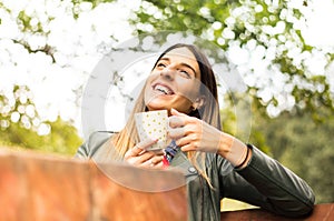 Pretty woman drinking coffee