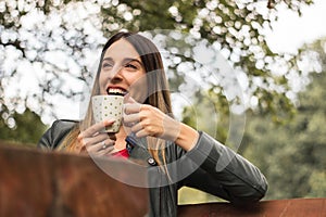 Pretty woman drinking coffee