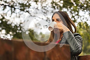 Pretty woman drinking coffee