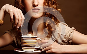 Pretty woman drinking coffee