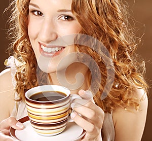 Pretty woman drinking coffee