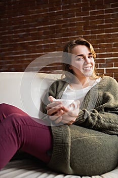 Pretty woman drinking coffee